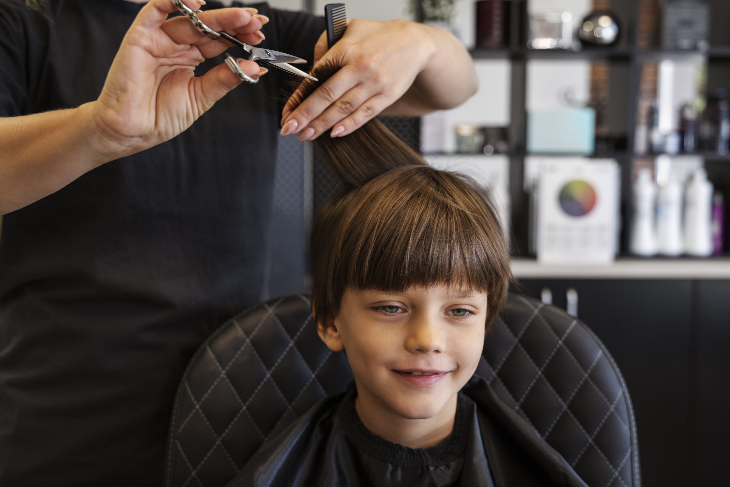 front-view-kid-getting-haircut-salon